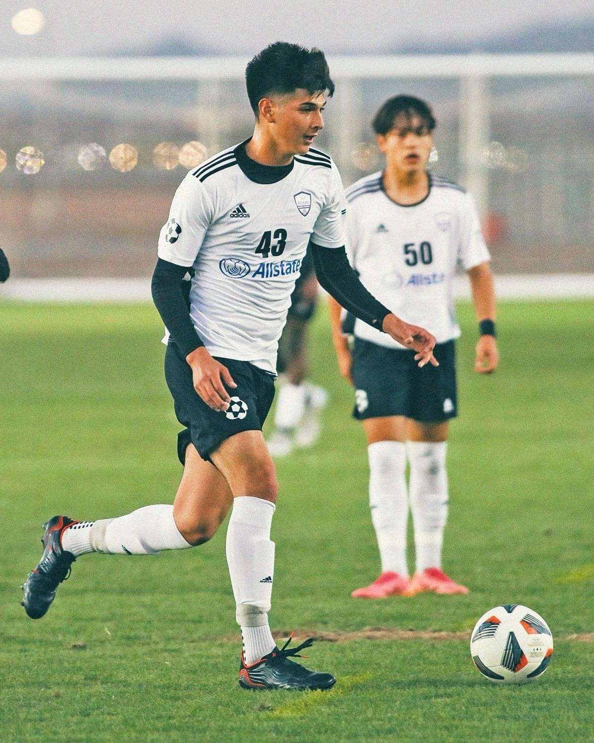 Soccer player controlling the ball during a match